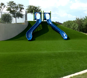 Commercial playground with turf surfacing