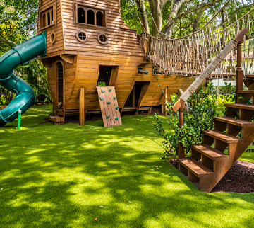 Backyard playground with turf surfacing