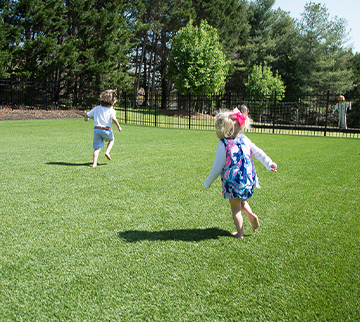 Children Playing Safely on Turf