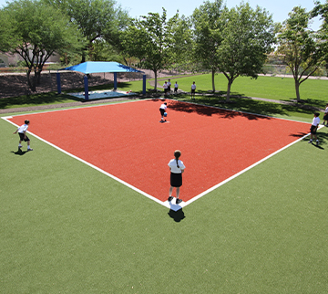 commercial kickball field with kids