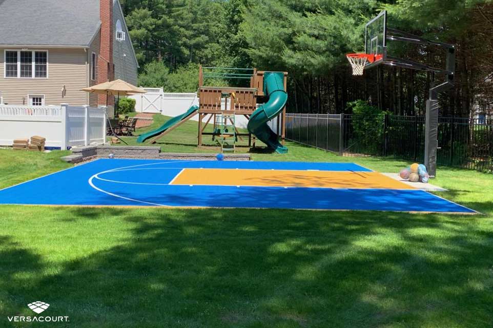 Small backyard half court basketball court