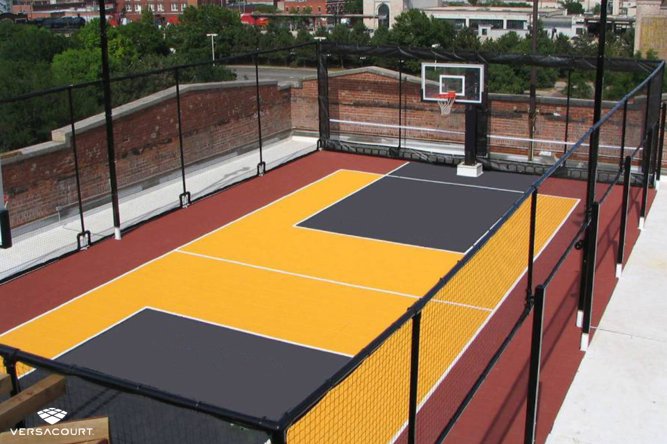 Rooftop with a yellow multi-sport game court
