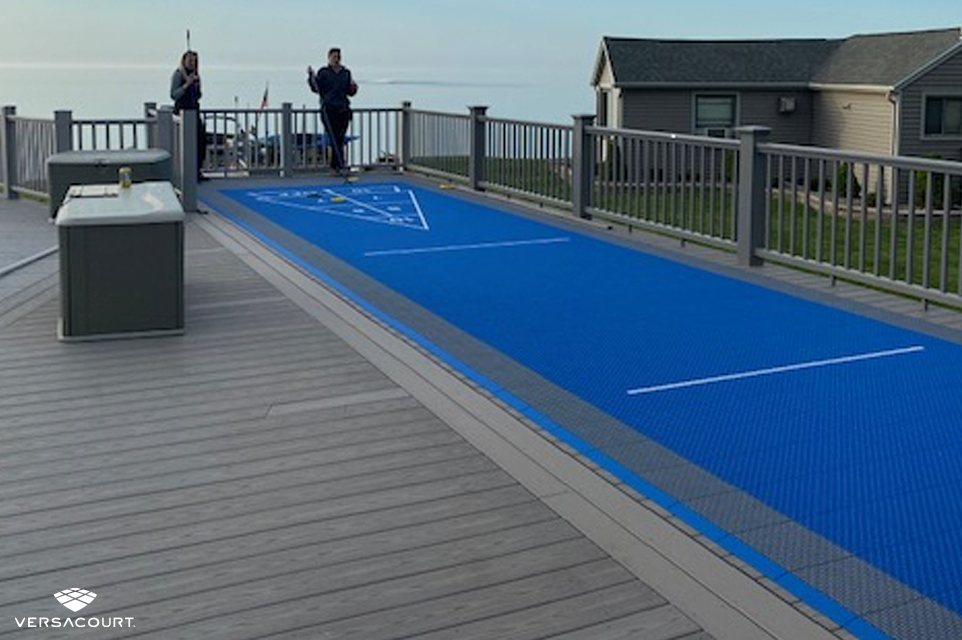 Shuffleboard court installed on the back deck of a home