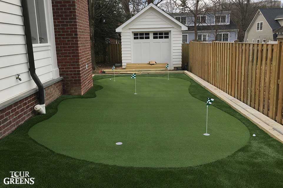 Synthetic grass putting green in the side yard