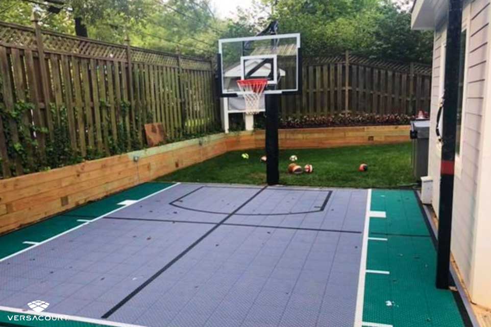 Small side yard with kid sized basketball hoop
