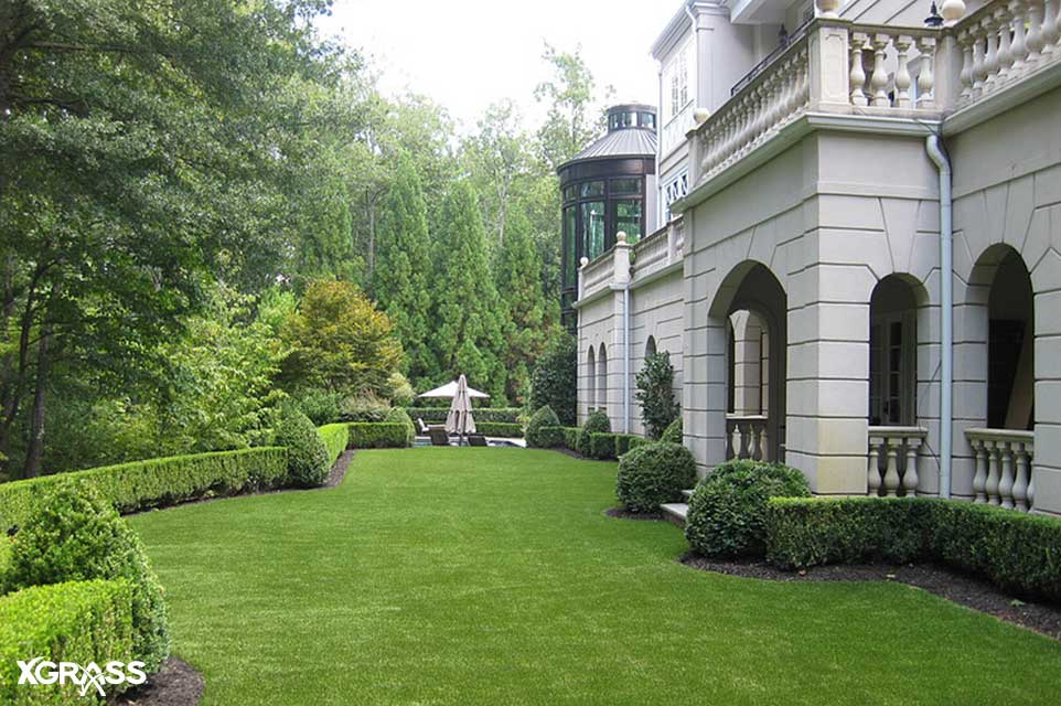 The side yard of a large home