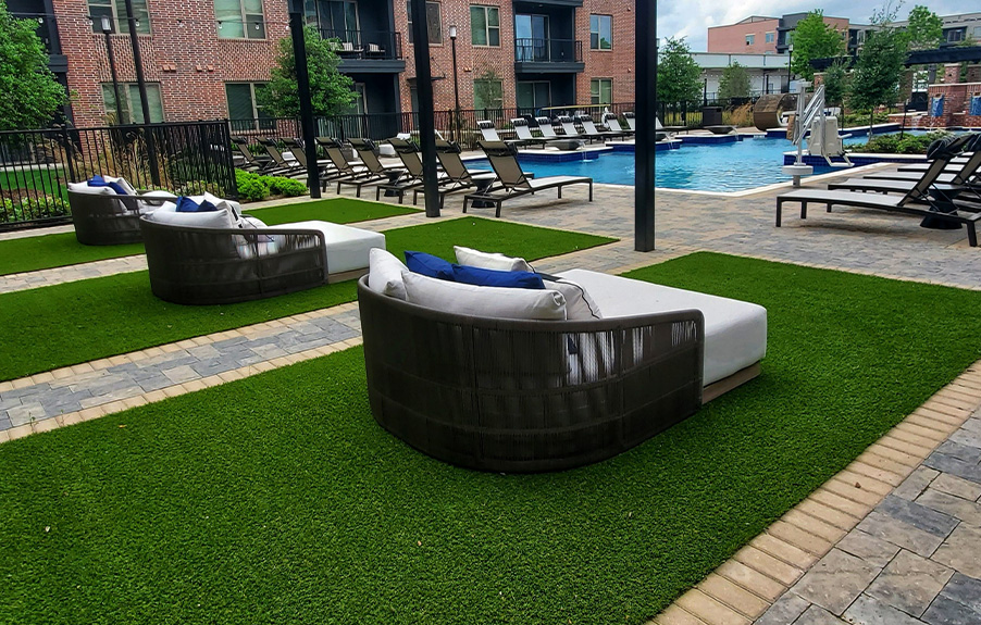Artificial grass pool surround at Dallas apartment complex