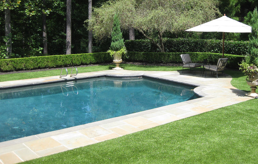 Artificial grass pool surround residential
