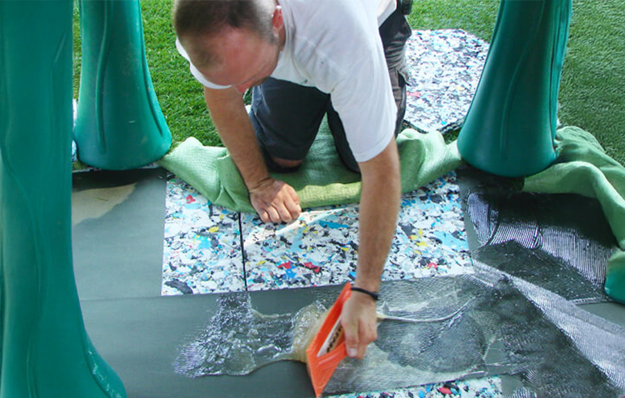 Playground pad installation