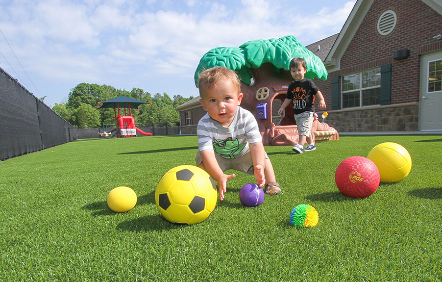 Children Playing on Turf Field